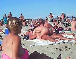 Beautiful love-making takes place on a beautiful beach.