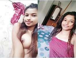Beautiful Indian girl in bra and panty getting wet.