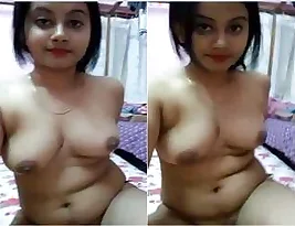 Hot Indian woman showing her curves in self-portrait.