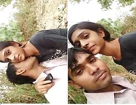 Young woman gets love in the open field.