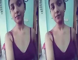 Super pretty Indo-Western woman showing her large breasts.