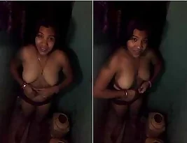 Young Indian girl strips and takes a shower.
