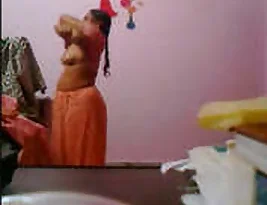 Secretly shot video of a mature Bhabhi in a red saree