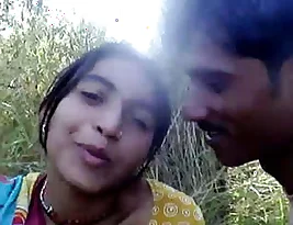 Outdoor sex in a rural Indian setting with a couple in the fields.