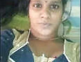 A young Tamil woman exposing her breasts and private part.