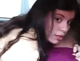 A beautiful college girl enjoys hot sex in the back seat of a car
