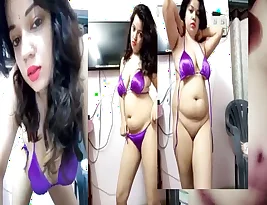 Private webcam showing an Indian woman stripping.