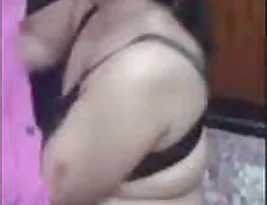 Hot Indian woman mixing work and pleasure