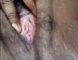 A beautiful girl from the Indian subcontinent reveals her breasts and vagina in part.