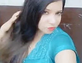 A girl from Pakistan is showing her breasts.