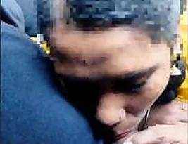 An Indian man gives a blow job to a girl in a car