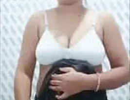 A hot Indian girl exposes her big assets.