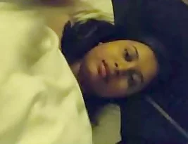 A cute girl performs a self-examination of her body while waiting for her lover.