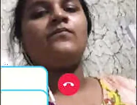 An erotic video of a bhabi exposing her shaved and wet pussy to her lover via video call.