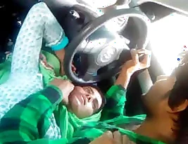 Indian couple’s romantic moment in a car
