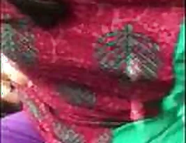Young Indian woman enjoys giving oral sex to her man in the great outdoors