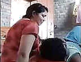 A couple performs a live cam show.
