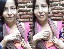 Pretty Indian woman flashing breasts to her boyfriend