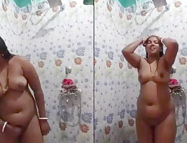 Self-pleasure in the restroom with a mature Indian woman