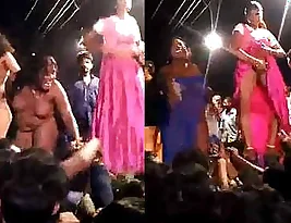 Women dancing naked in a village
