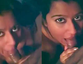 Beautiful Indian woman gives blow job to her lover.