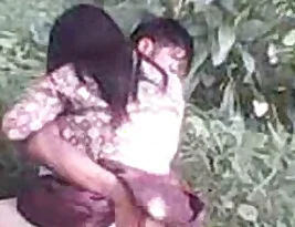 A beautiful girl having sex outside in the wilderness.