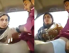 A Pakistani couple having sex in a car.