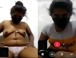 More of a Sri Lankan woman showing her body to a video call participant.