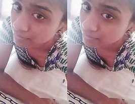 A beautiful Tamil woman masturbates while on a video call with a black man.
