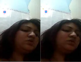 Beautiful Indian girl gives a fingering solo performance.