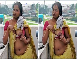 A horny Tamil woman Naughty Bhabhi exposes her tits and vagina in a video call.