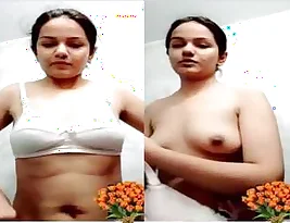 A beautiful Indian woman shows her body in a video call.