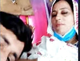 Pretty Pakistani wife with big boobs gives blow job to her hubby
