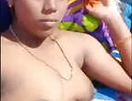 A married Tamil woman exposes her breasts and vagina.
