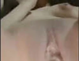 A beautiful Indian woman with a freshly shaved vagina tastes her own juices.