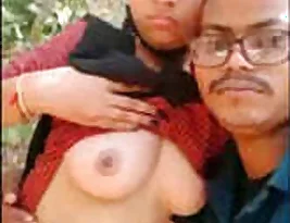 A traditional Indian couple beautifies nature with their sensual breast sucking.